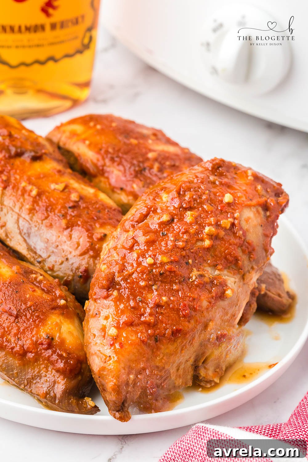 Fiery Cinnamon Crockpot Chicken 10 Crock Pot Fireball Chicken - a flavorful slow cooker chicken seasoned with a homemade Fireball-flavored sauce! The whiskey sauce makes the chicken so juicy and delicious.