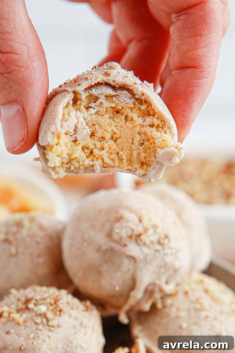 A vibrant display of Apple Pie Truffles, with a warm, inviting glow, perfect for enticing guests at any festive occasion.