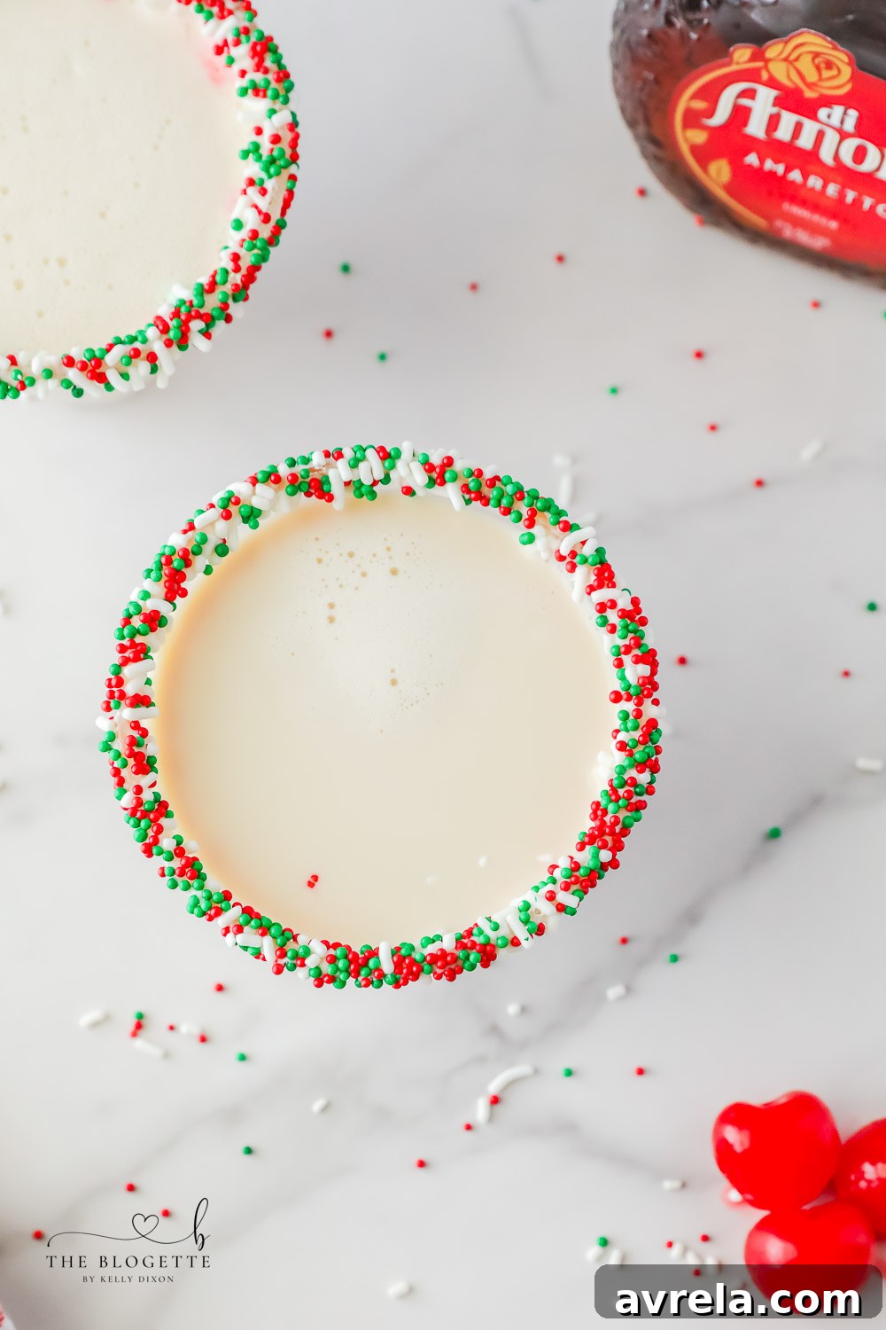 Frosted Sugar Dream 10 A sugar cookie cocktail for Christmas! Vanilla-rimmed martini glass filled with whipped cream vodka, Irish Cream, and Amaretto, ready to enjoy.