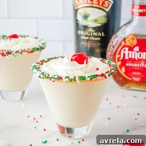 Frosted Sugar Dream 12 A sugar cookie cocktail for Christmas! Vanilla-rimmed martini glass filled with whipped cream vodka, Irish Cream, and Amaretto.