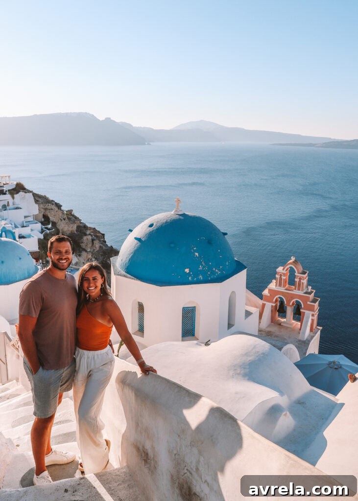 Oia town in Santorini, with its classic white buildings and blue domes overlooking the caldera.