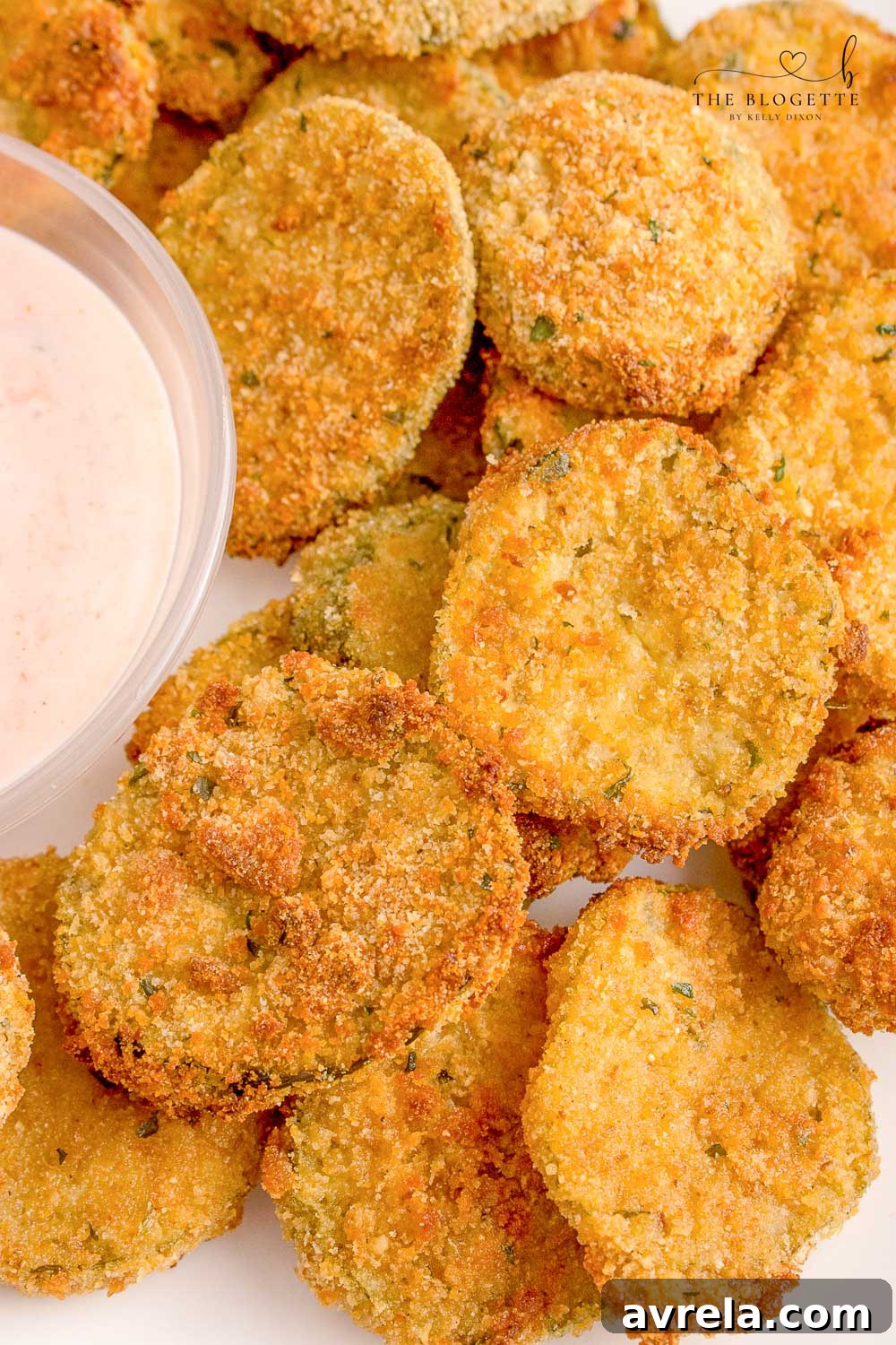 Crispy Air Fryer Fried Pickles 10 A close-up of freshly air-fried pickles served in a bowl, showing off their golden-brown breading.