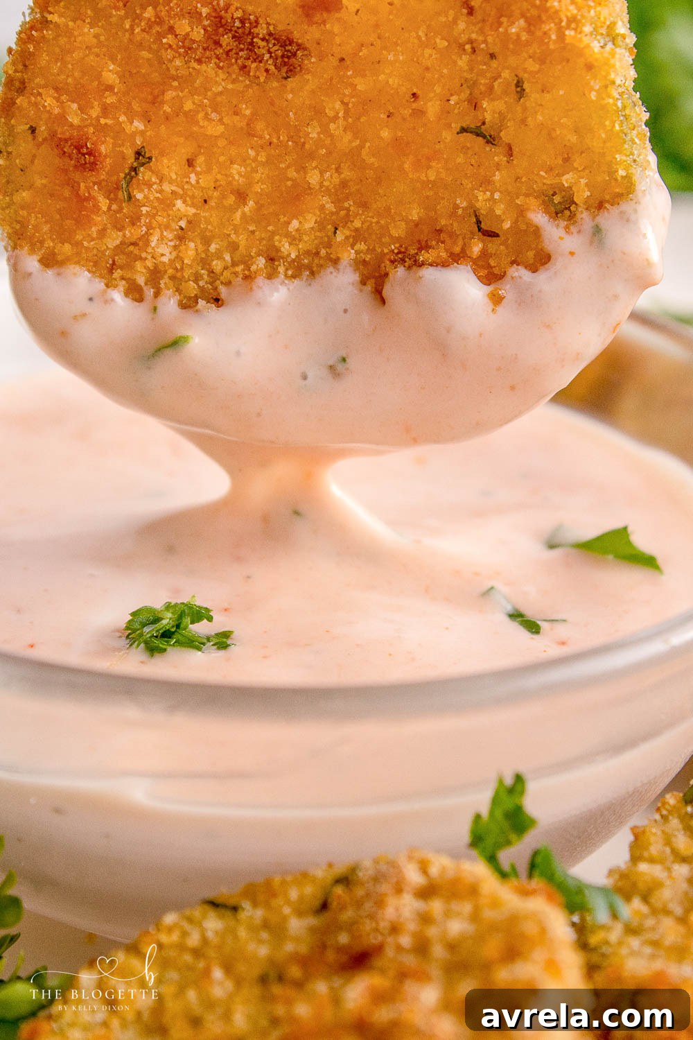 Air fryer fried pickles in dipping sauce