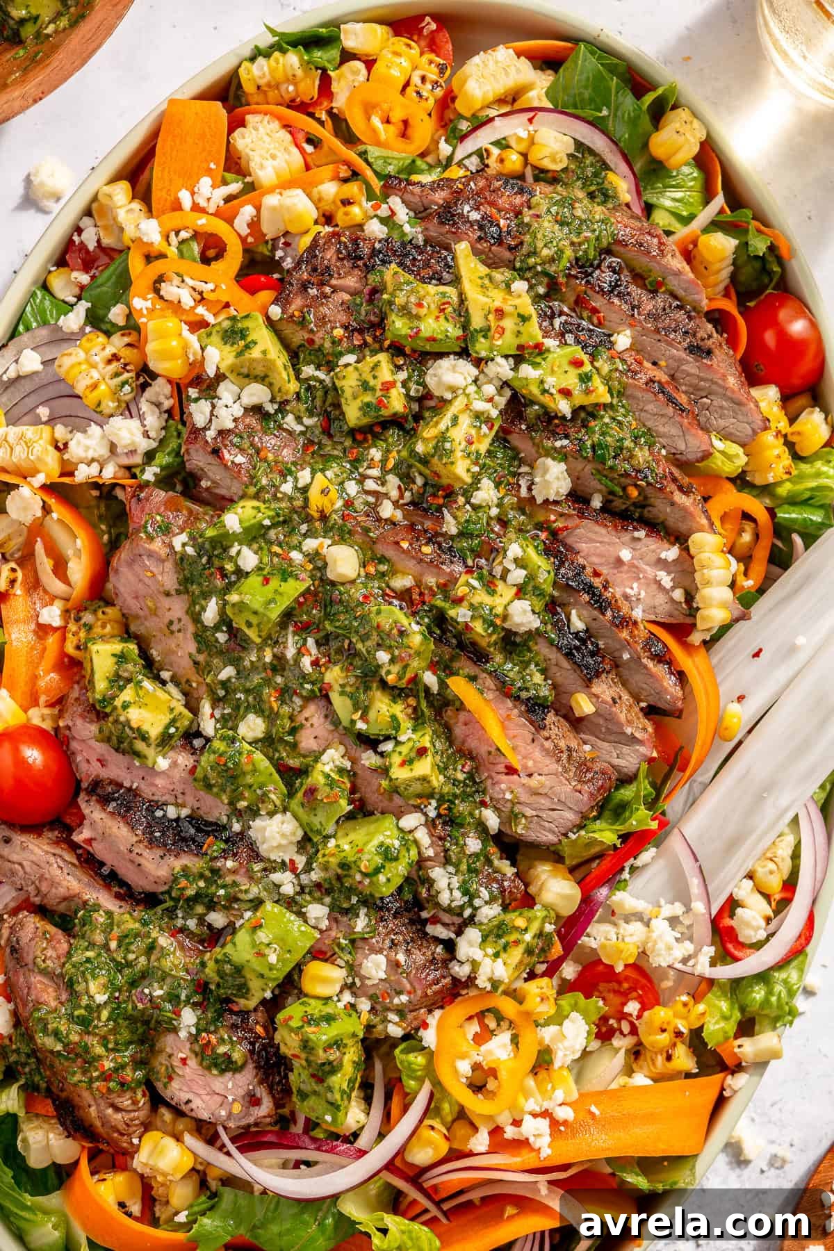 Flank Steak and Avocado Chimichurri Salad