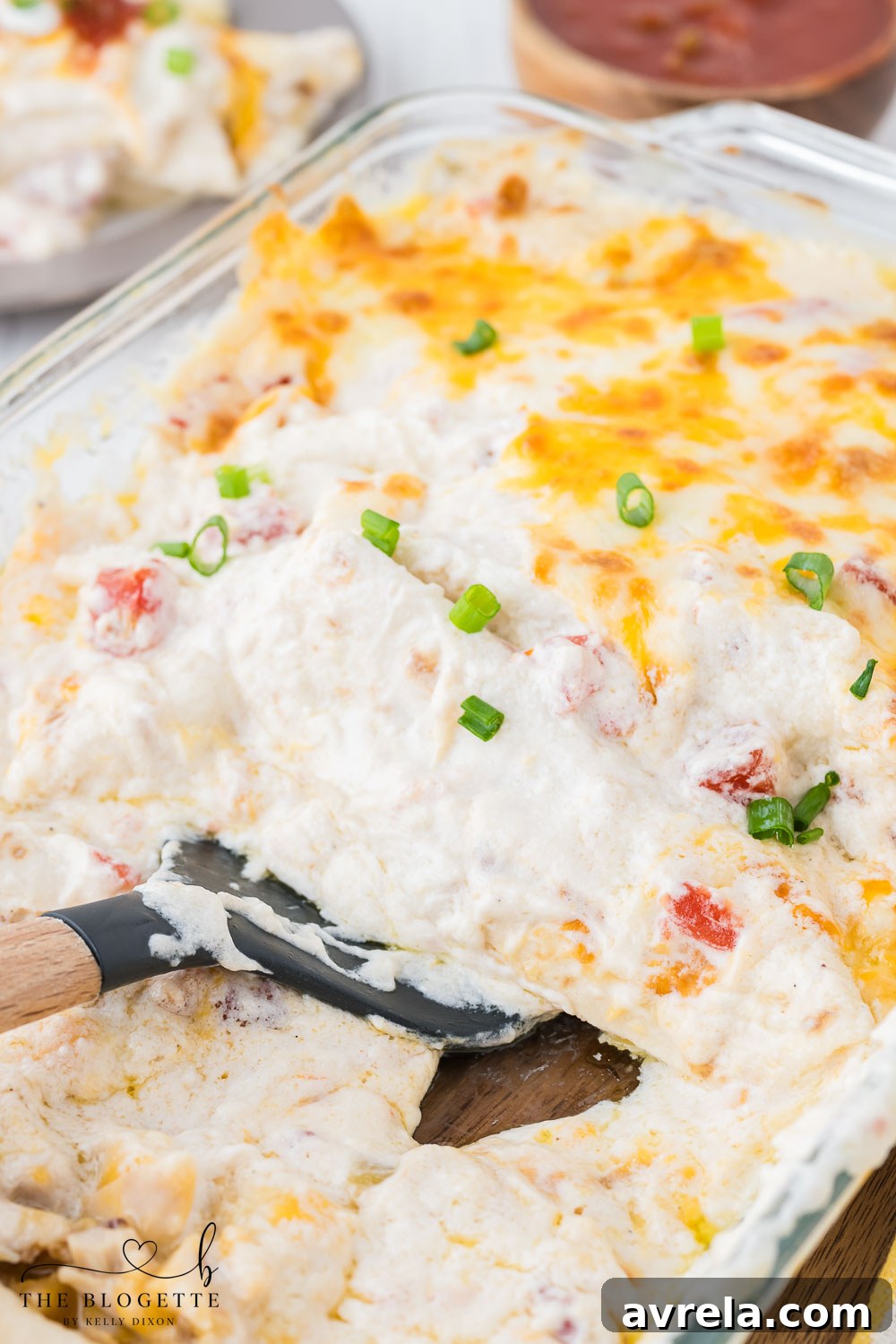 Creamy White Chicken Enchiladas, baked to perfection with melted cheese on top, ready to be served.