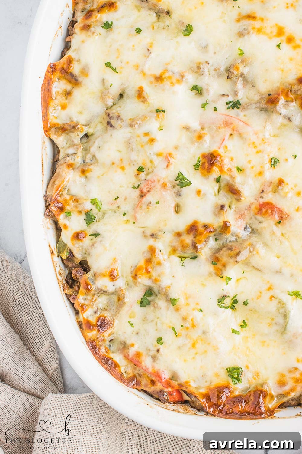 Philly Cheesesteak Comfort Bake 3 A second view of the Easy Philly Cheesesteak Casserole, showcasing its golden-brown, melted cheese topping and hearty ingredients, ideal for any occasion.