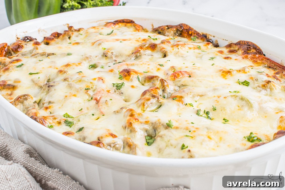 Philly Cheesesteak Comfort Bake 10 A simple yet satisfying Philly Cheesesteak Casserole, showcasing its rich texture and inviting golden cheese crust, ready to be enjoyed.
