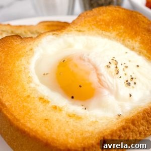 5-ingredient Air Fryer Egg Toast! Make perfect eggs on toast in your air fryer with this easy 15-minute breakfast recipe!