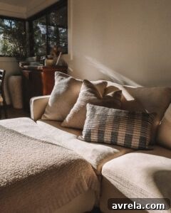 A styled corner of the Sixpenny Amelia U-Shape Sectional with decorative pillows