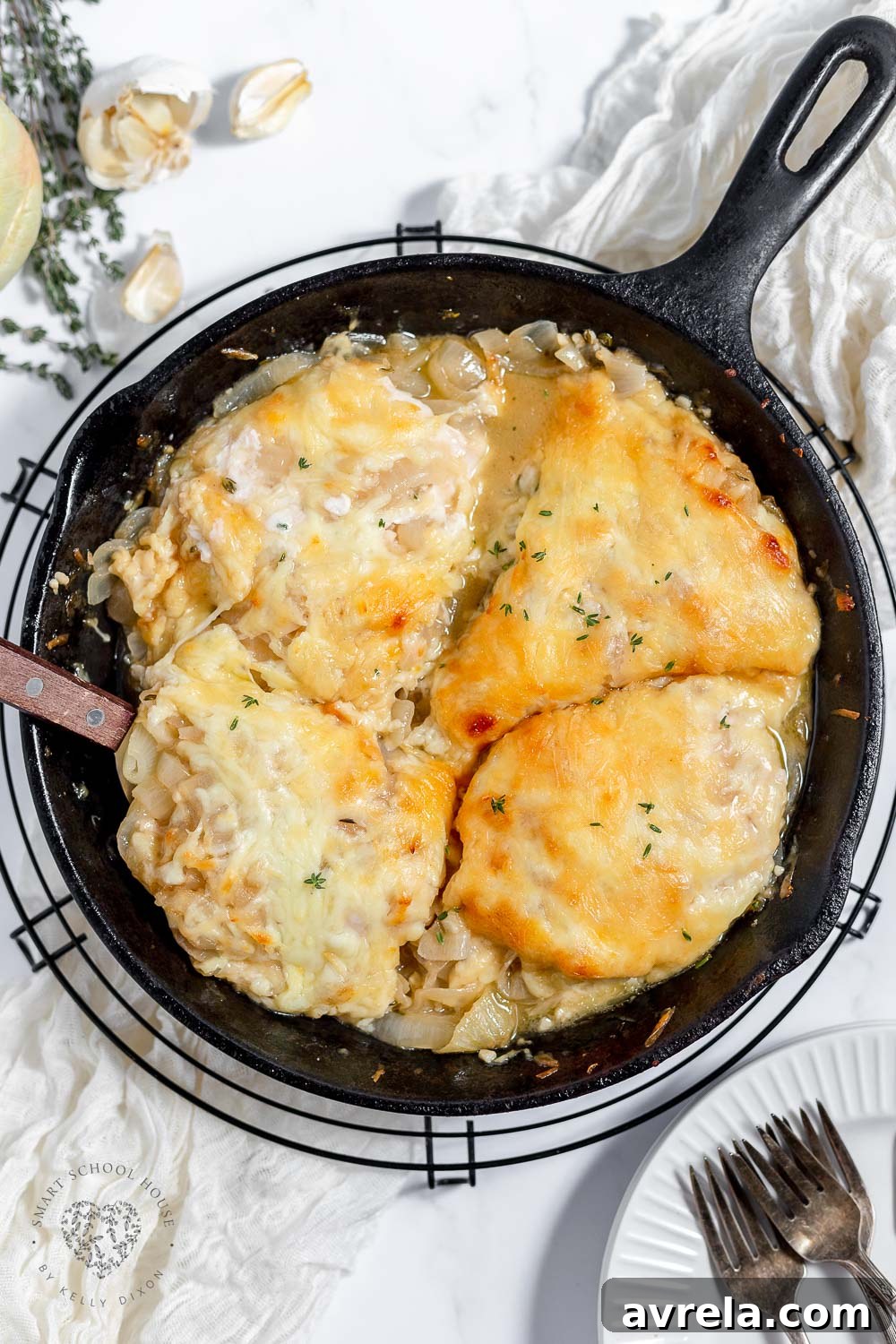 French Onion Chicken features juicy chicken breast, melted butter, caramelized onions, and lots of gooey melted cheese all cooked in one fabulous skillet.
