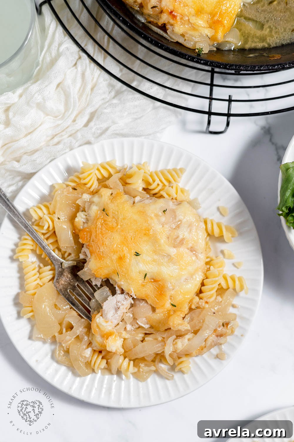 French Onion Chicken features juicy chicken breast, melted butter, caramelized onions, and lots of gooey melted cheese all cooked in one fabulous skillet.
