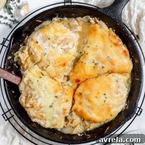 French Onion Chicken features juicy chicken breast, melted butter, caramelized onions, and lots of gooey melted cheese all cooked in one fabulous skillet.