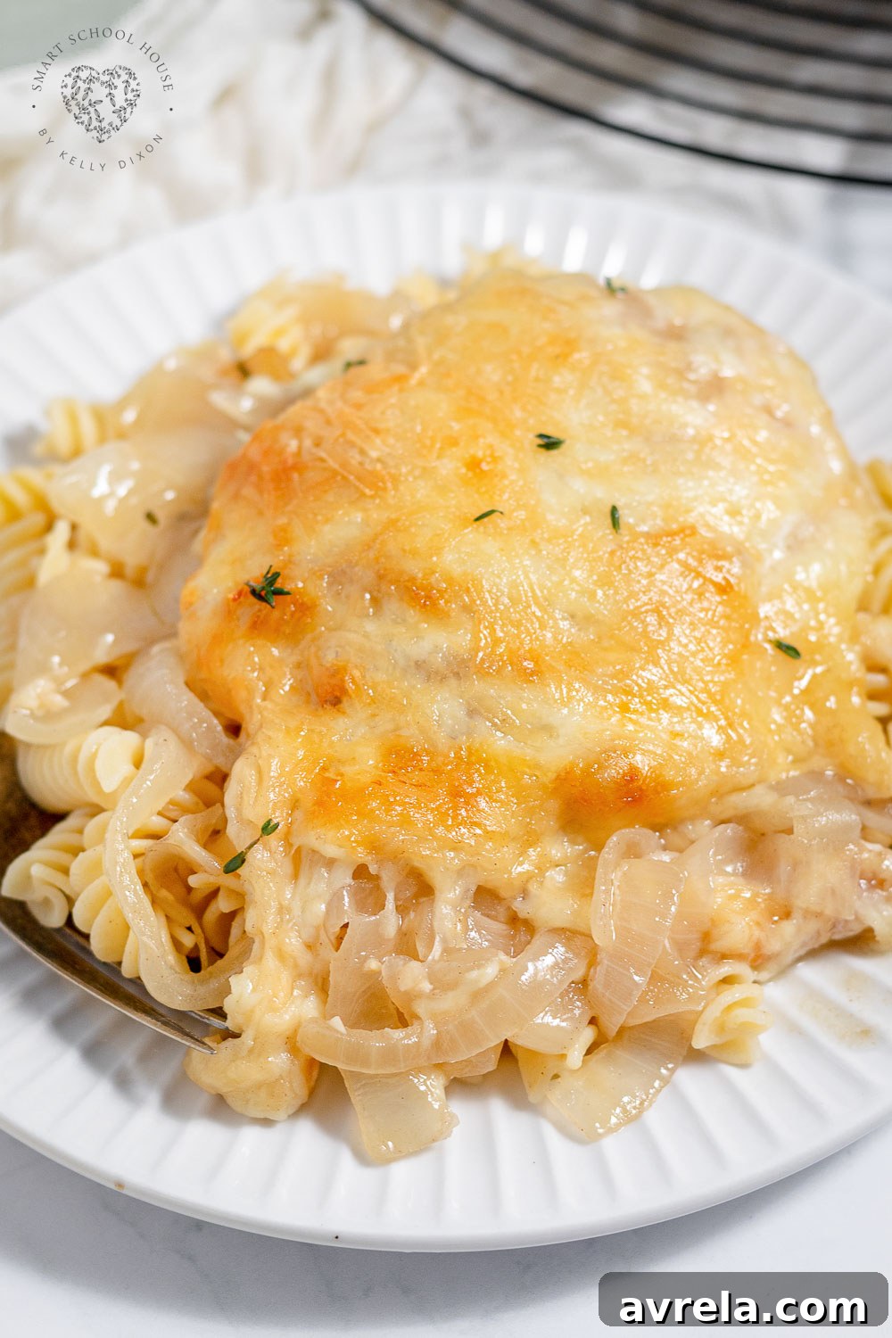 French Onion Chicken features juicy chicken breast, melted butter, caramelized onions, and lots of gooey melted cheese all cooked in one fabulous skillet.