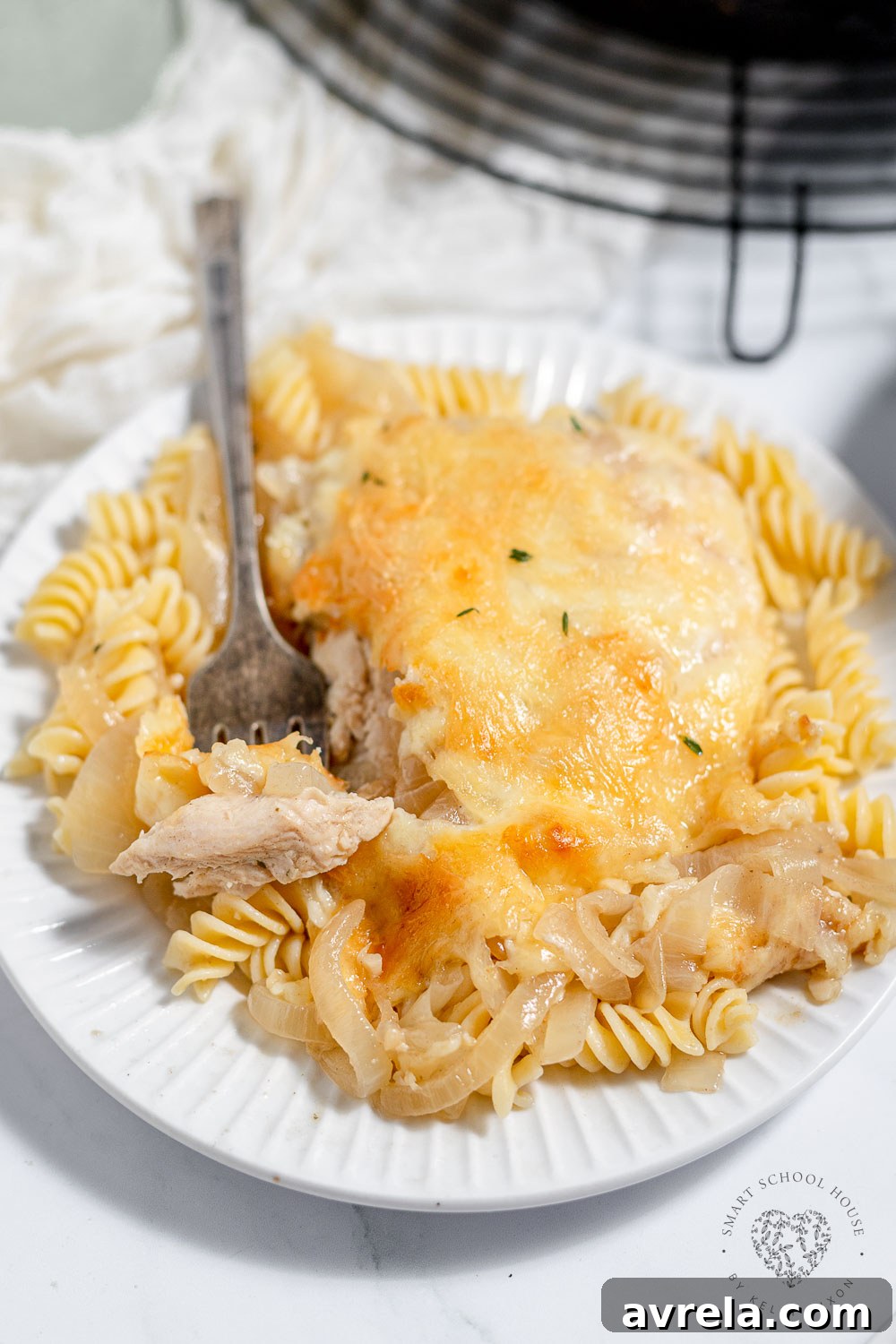 French Onion Chicken features juicy chicken breast, melted butter, caramelized onions, and lots of gooey melted cheese all cooked in one fabulous skillet.