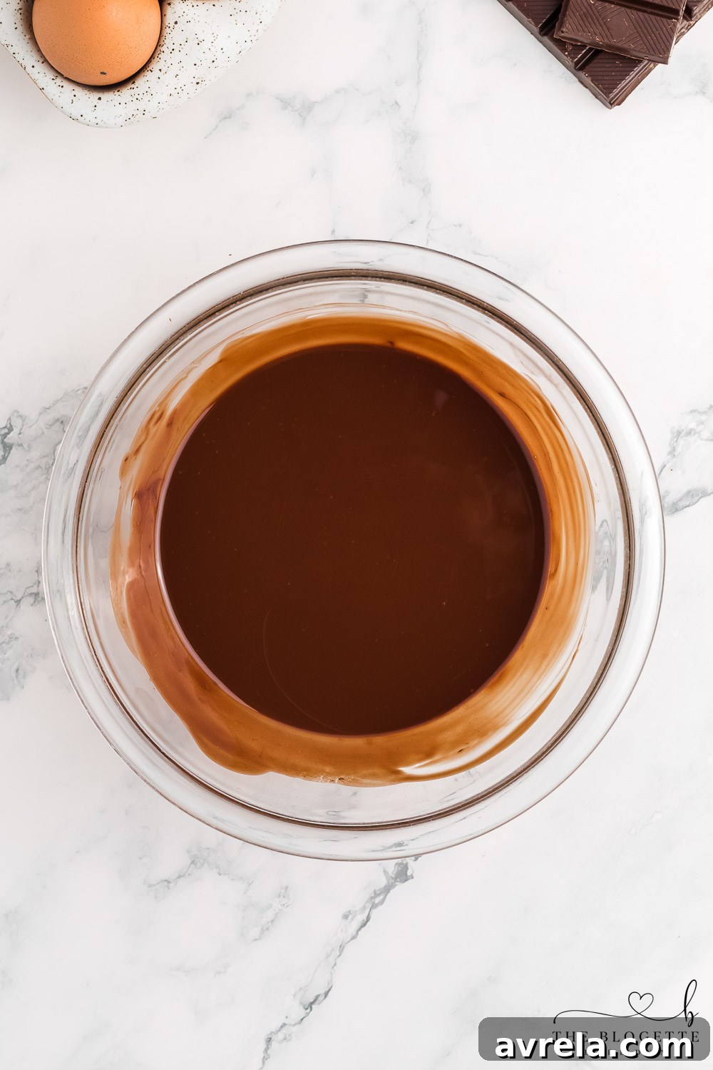 Melted chocolate and butter, a key component of the brownie batter.