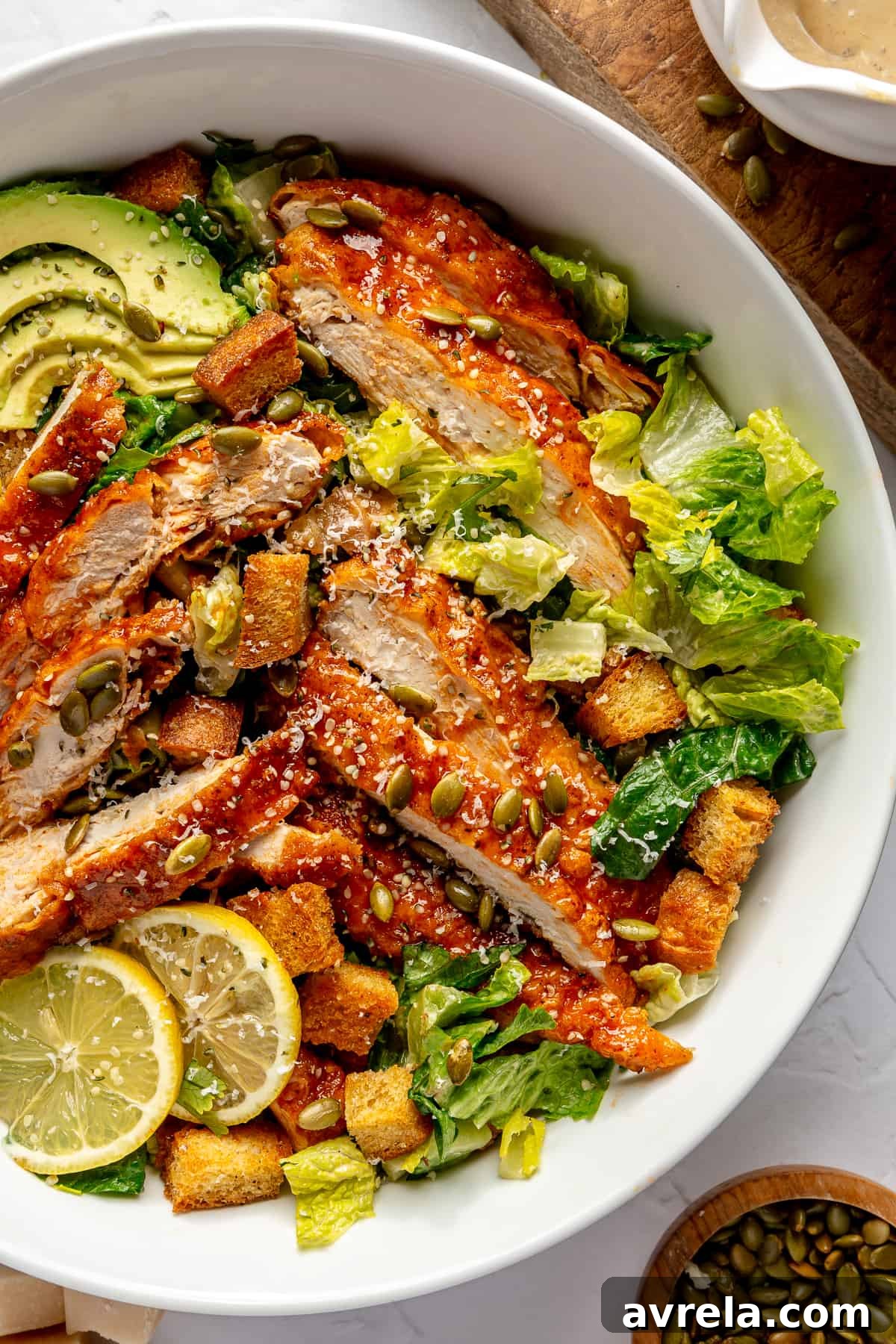 Hot Honey Crispy Chicken Caesar 2 Crispy Hot Honey Chicken Caesar Salad, a close-up of the dish