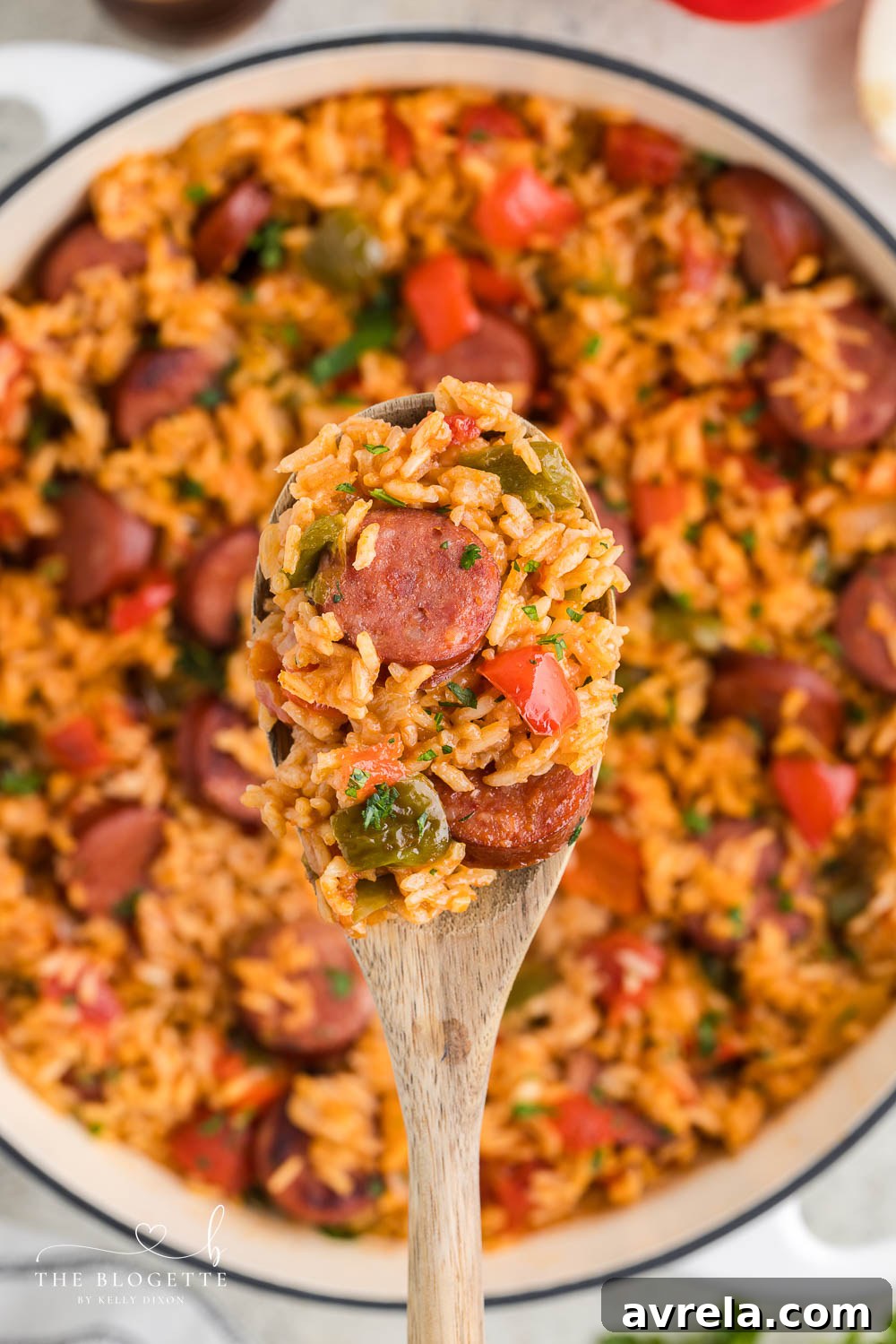 A serving of the finished Sausage and Rice Skillet, garnished and ready to eat.
