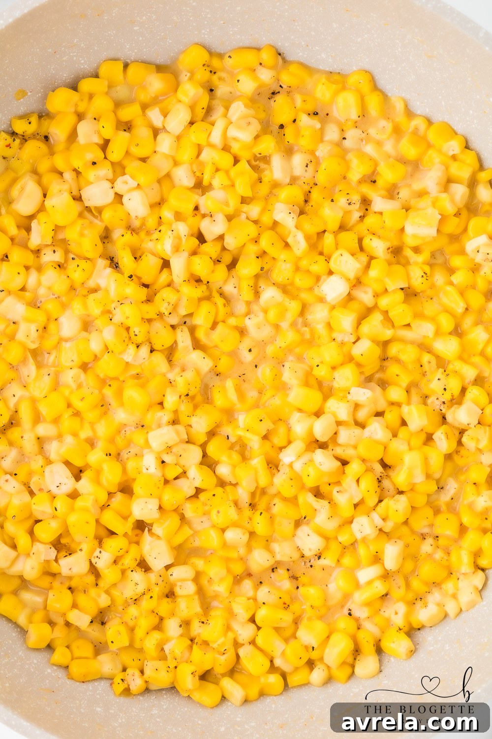 Finished Honey Butter Skillet Corn in a skillet, ready to be served.