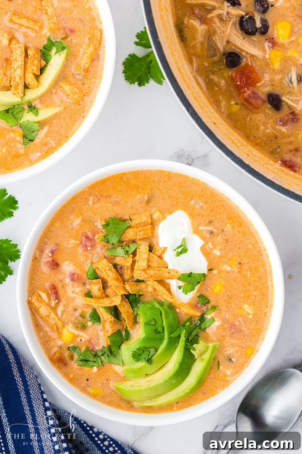 Deliciously creamy Chicken Enchilada Soup with colorful toppings, ready in 20 minutes for a quick meal.