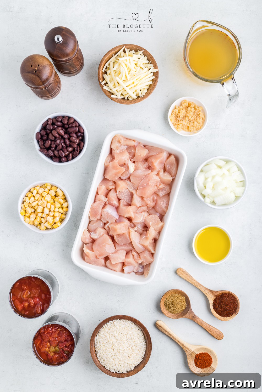 A selection of fresh and pantry ingredients laid out for Tex Mex Chicken and Rice preparation.