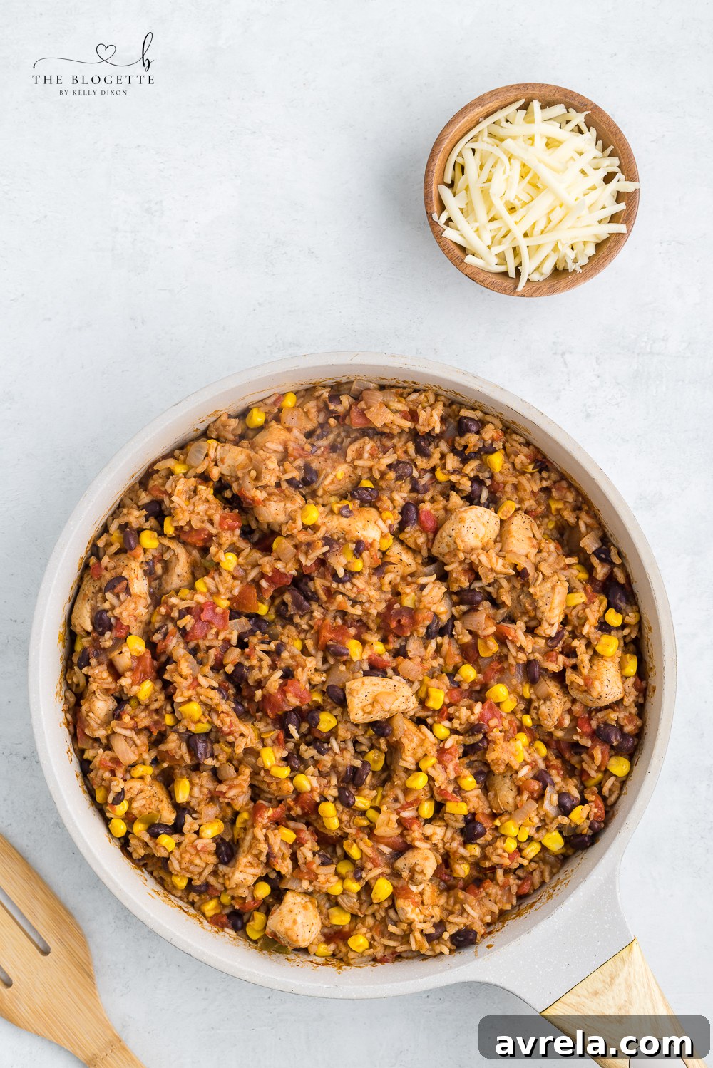 The Tex Mex chicken and rice mixture simmering in the pan, absorbing liquid.