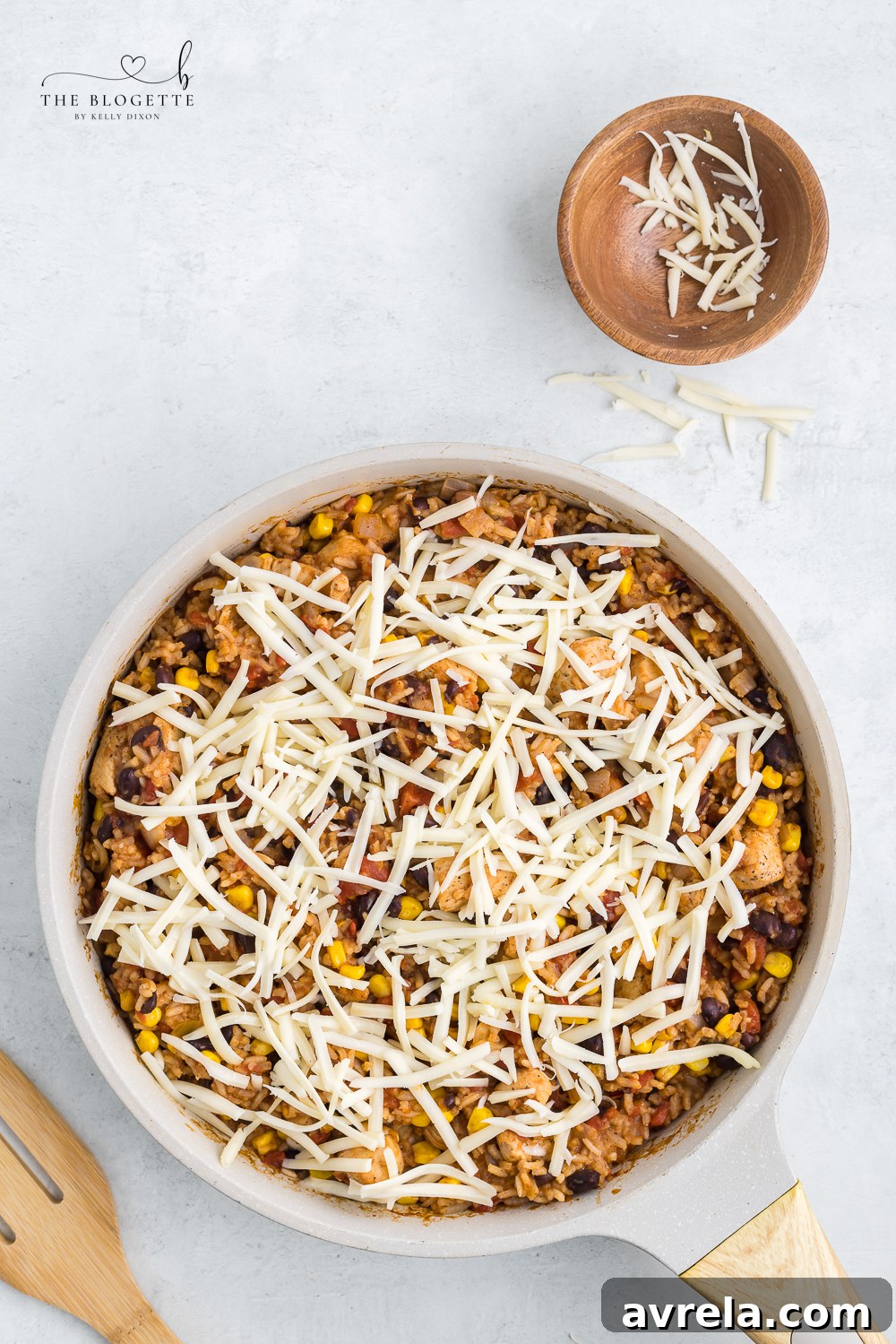 Shredded Monterey Jack cheese generously sprinkled over the hot Tex Mex Chicken and Rice.