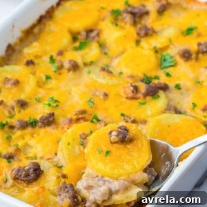 Hamburger and Potato Casserole is a comforting and hearty dinner made in one dish! Potatoes and bacon in a creamy and cheesy sauce.