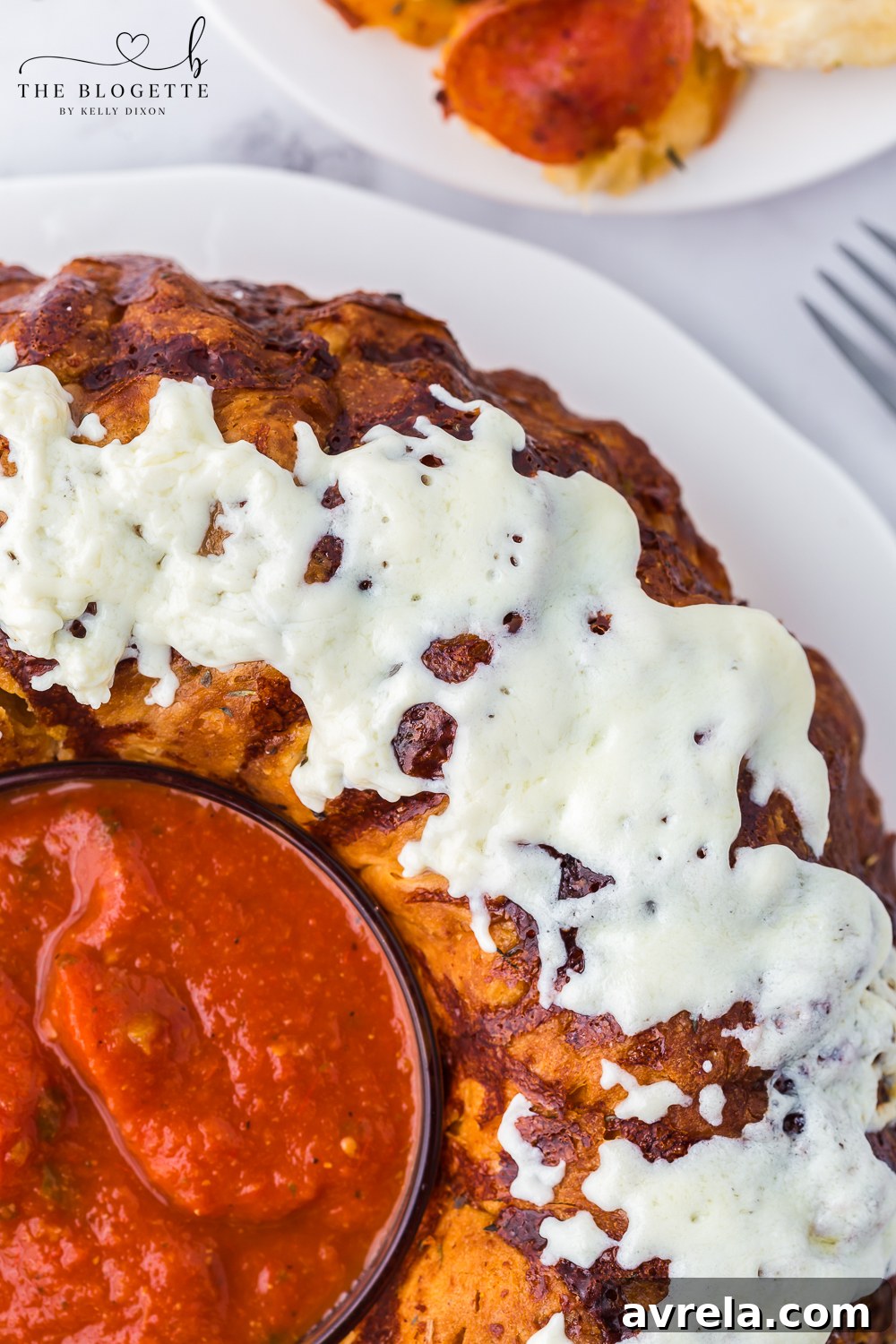 Cheesy Pizza Pull-Apart Bread 8 Freshly baked Pull-Apart Pizza Bread cooling on a wire rack.