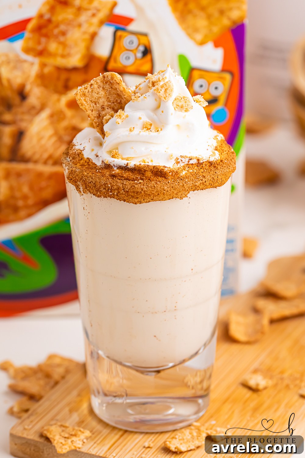 Toasted Spice Shooter 2 Cinnamon Toast Shots are a fun and festive mix of rum and whiskey! A rich and sweet cereal inspired drink topped with whipped cream.