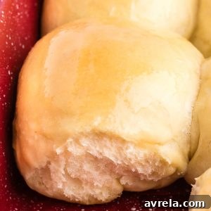 Fluffy and buttery Homemade Dinner Rolls are the perfect side for your next evening meal. They are easy to make and better than store-bought!