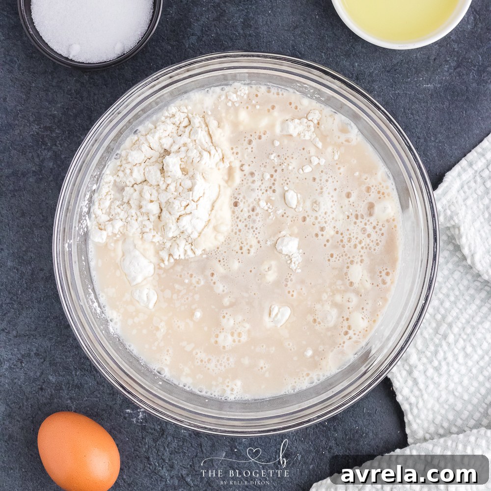 Combine yeast mixture with flour and salt