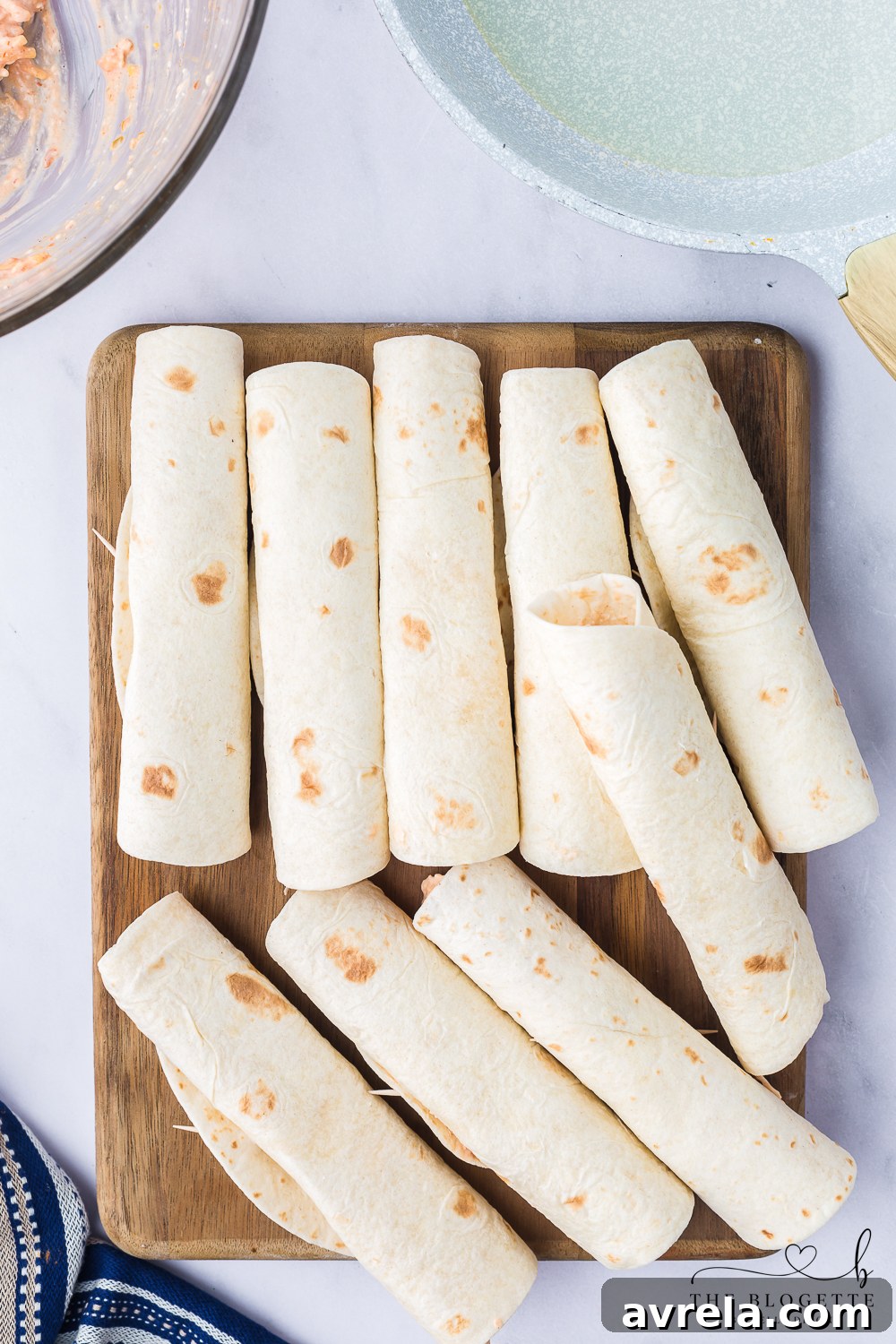 Golden Crispy Chicken Taquitos 6 Use a toothpick to secure the tortilla closed.