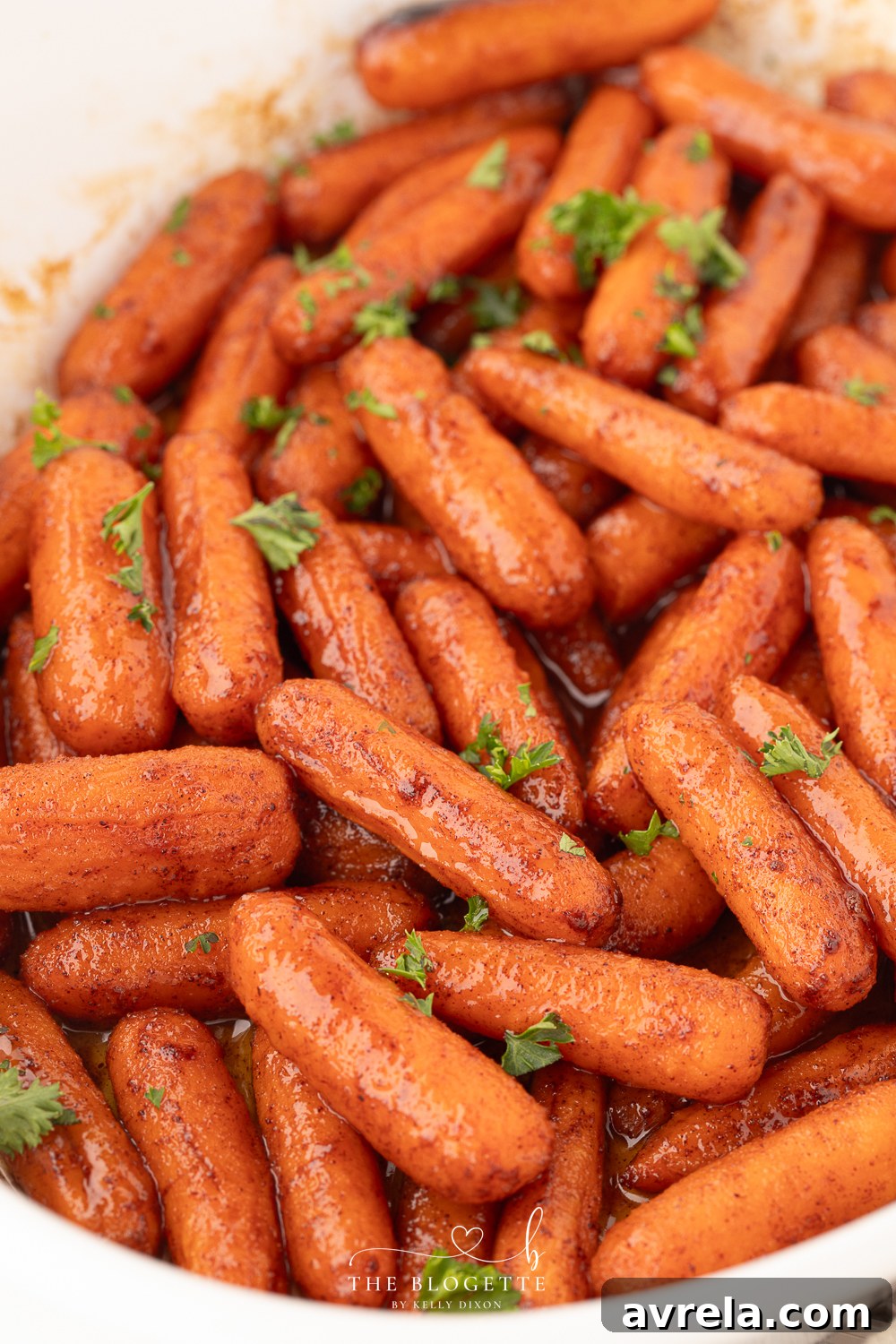 Golden-brown Honey Roasted Baby Carrots straight out of the oven, glistening and tender.