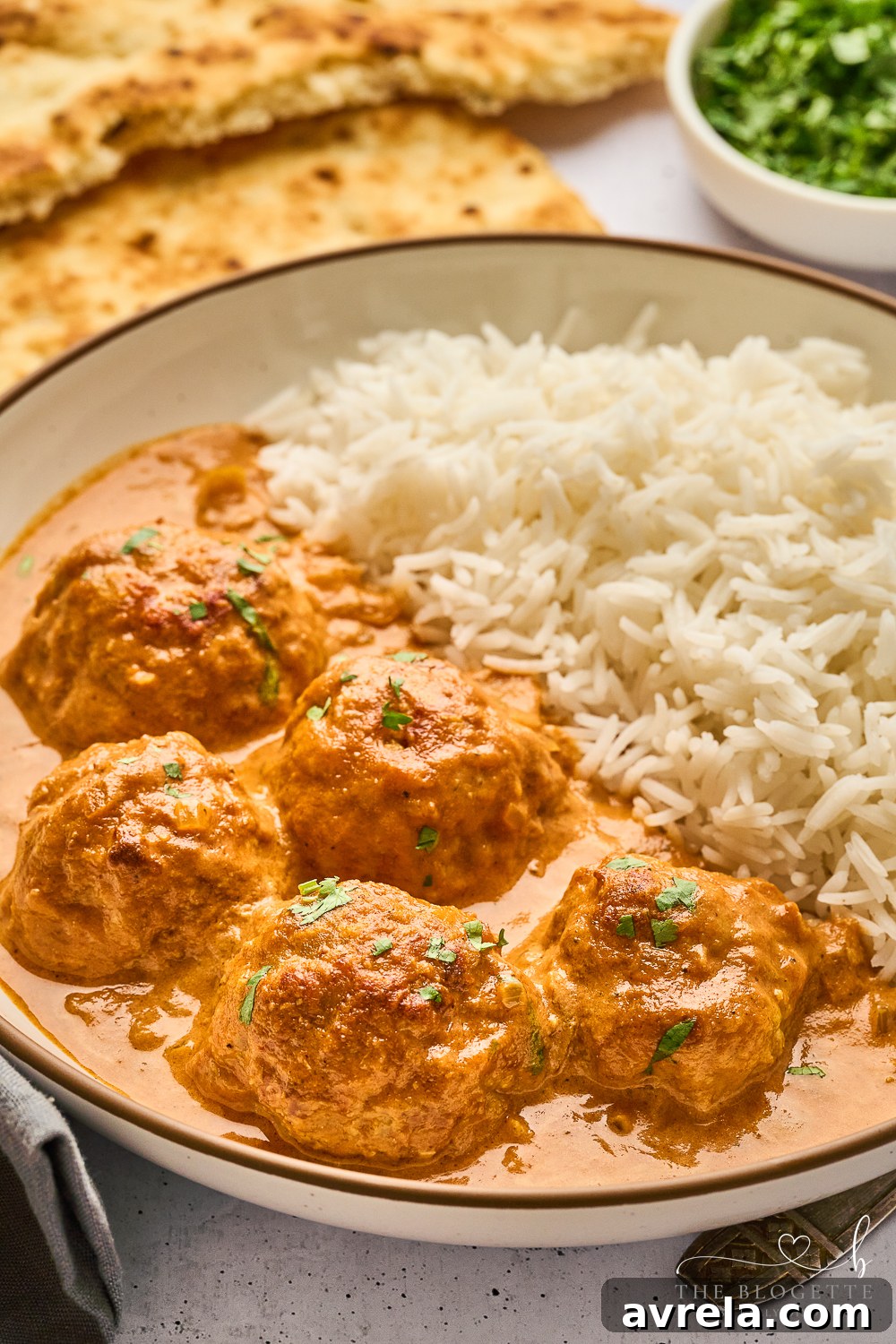Velvety Makhani Sauce 2 A bowl of creamy Butter Chicken Sauce, ready to be served over rice or with naan.