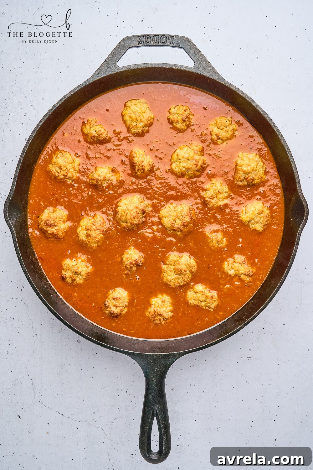 Velvety Makhani Sauce 9 Creamy butter chicken sauce with meatballs, ready to be served.
