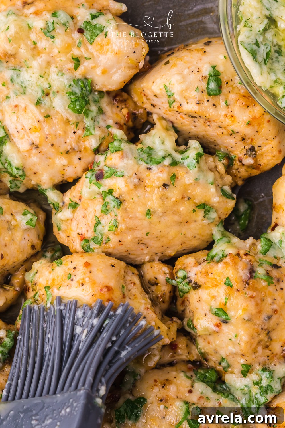 Garlic Parmesan Chicken delivers a wonderful blend of savory and cheesy tastes, featuring succulent, roasted chicken immersed in a rich and comforting marinade.