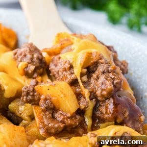 A delicious Sloppy Joe Skillet with ground meat, spices, and tomato sauce, all cooked together for an easy and hearty meal.