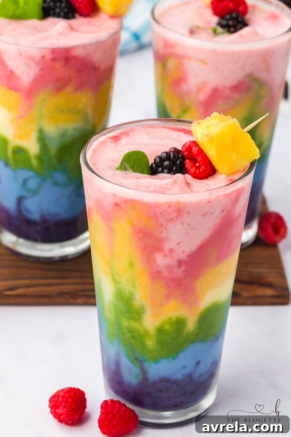 Kaleidoscope Smoothie 21 Rainbow Smoothie garnished and ready to serve