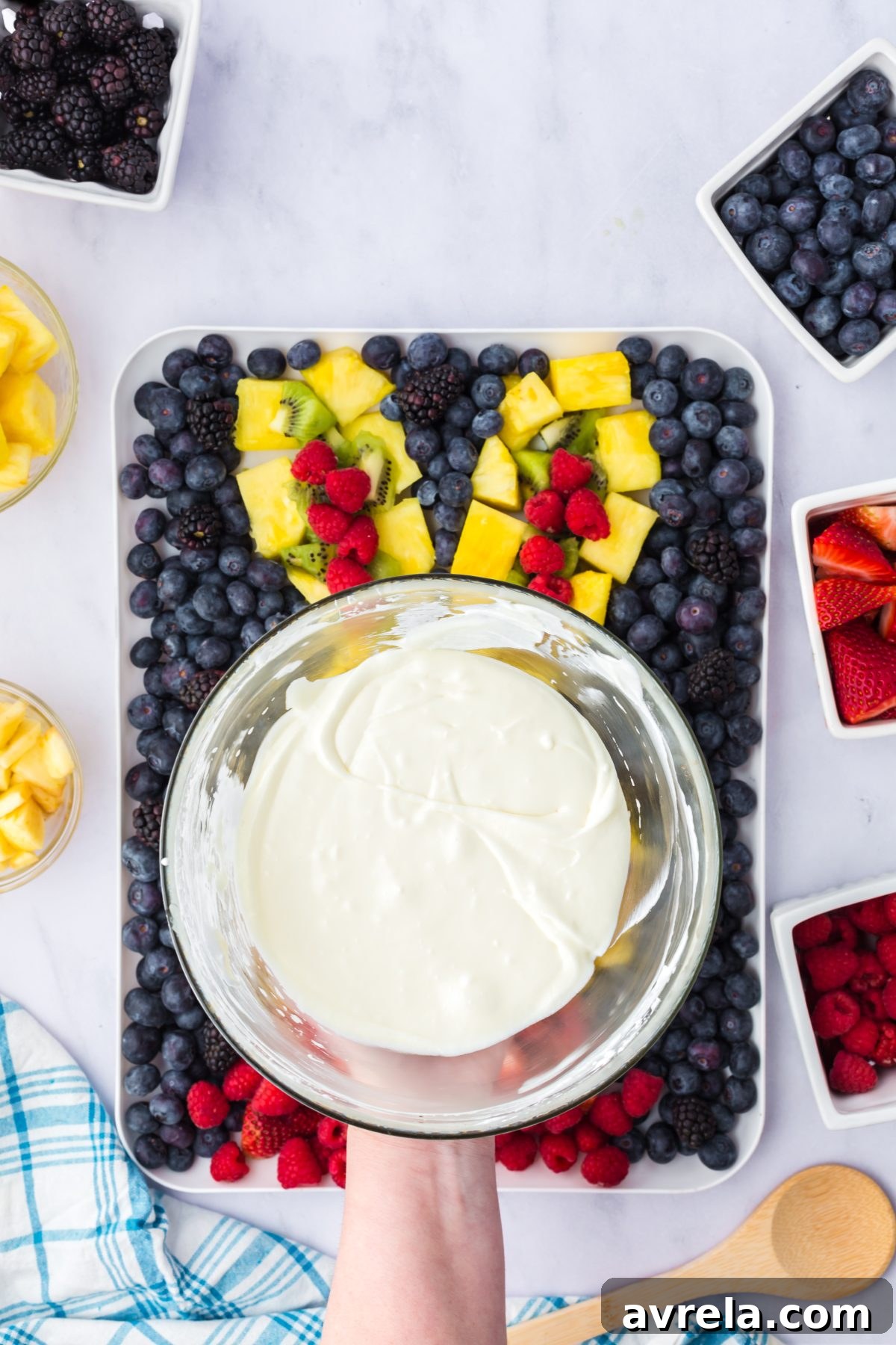 Colorful Easter Fruit Medley 14 Blended ingredients for the fruit dip in a bowl, showing its creamy texture.