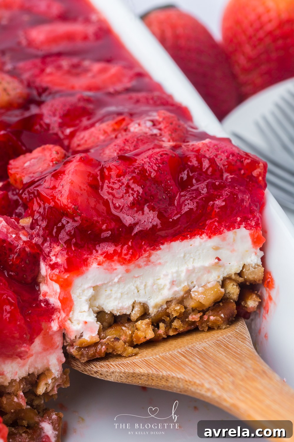 Strawberry Pretzel Salad recipe! Pretzel crust with a creamy layer of cream cheese and whipped topping, topped with Jello and strawberries!