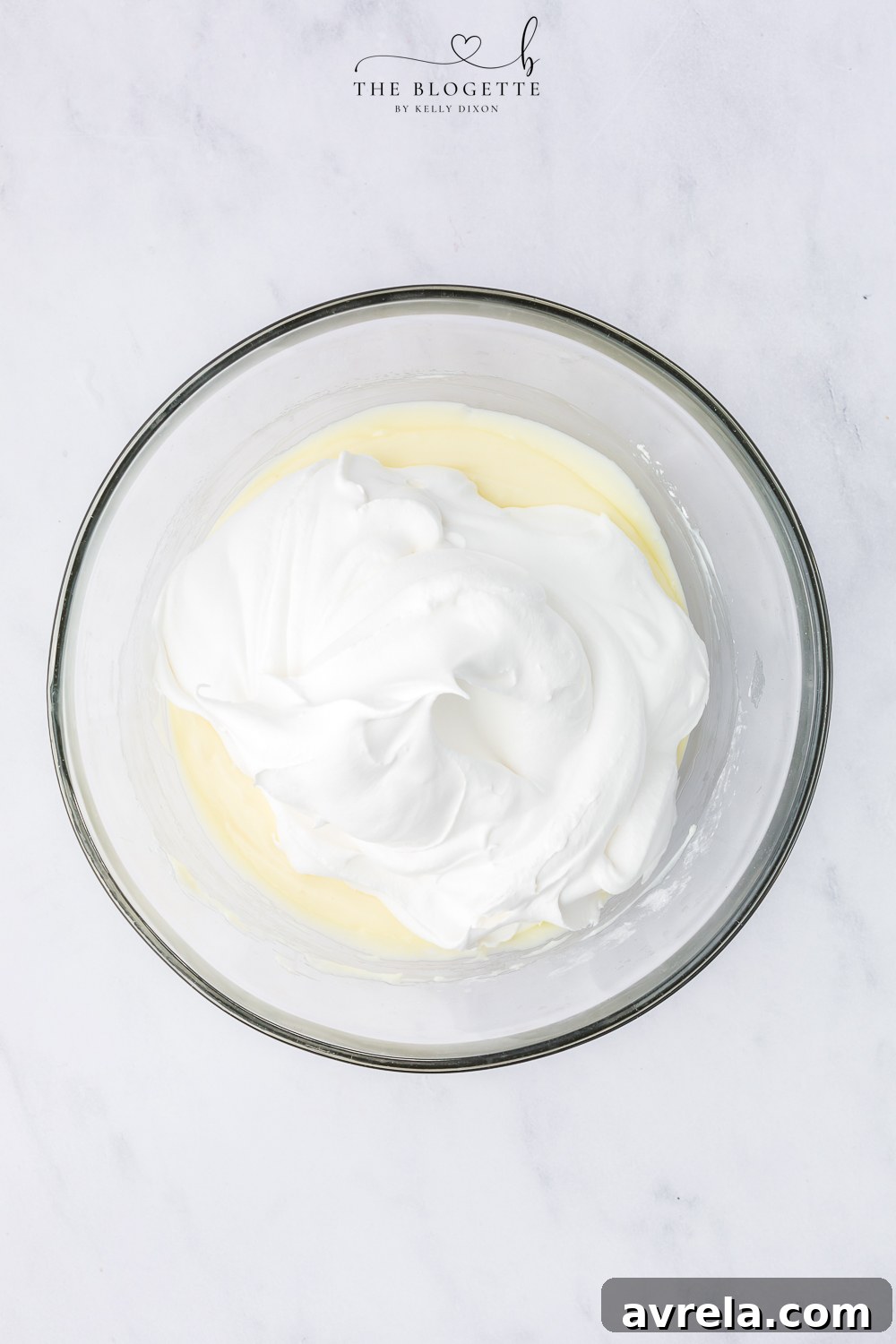Fold in the whipped topping.