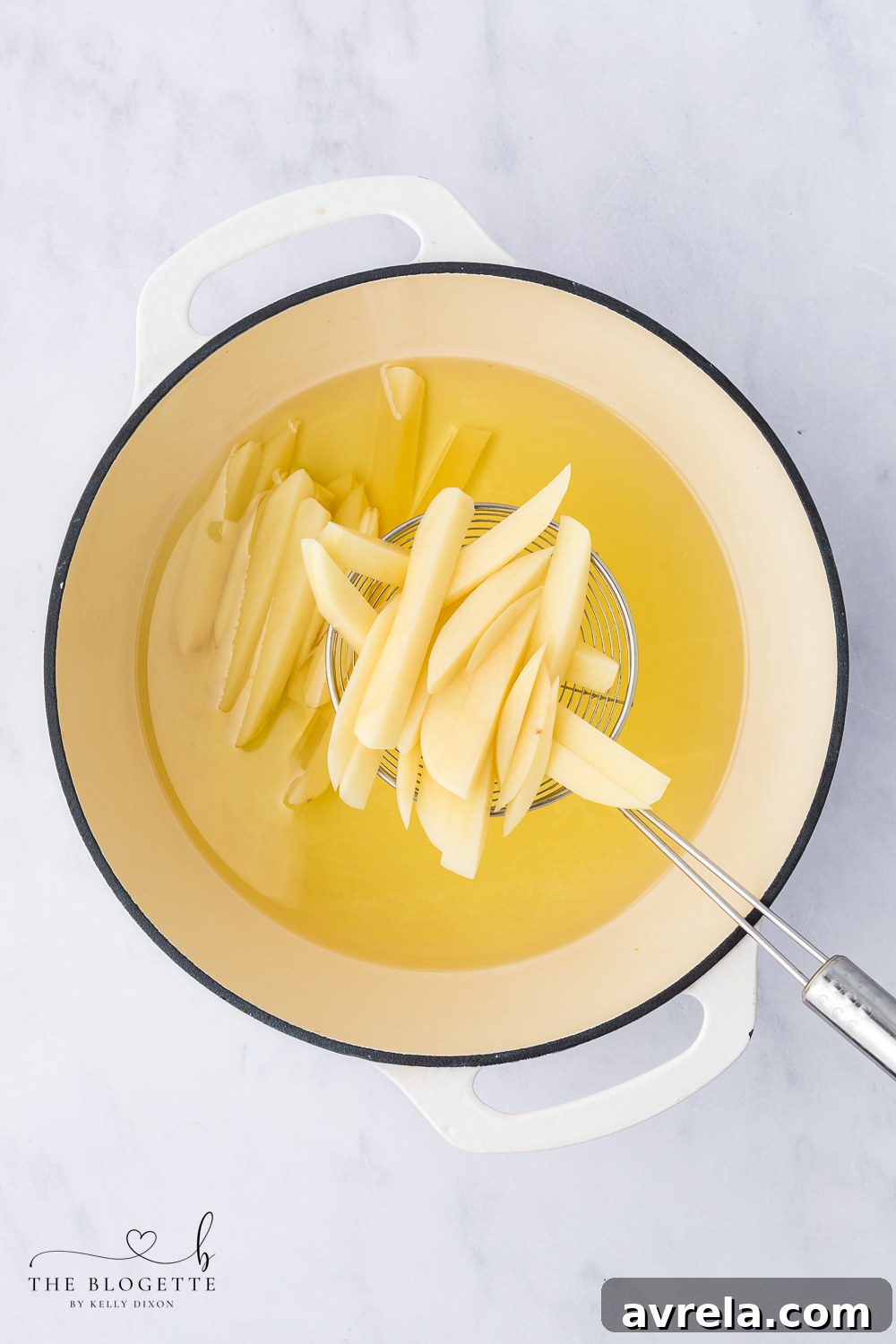 Fry the potatoes in hot oil