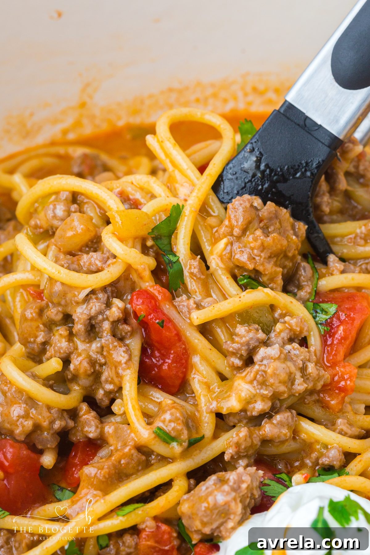Easy One-Pot Taco Spaghetti (Cheesy Tex-Mex Pasta). A full pot of delicious, cheesy pasta ready to serve.