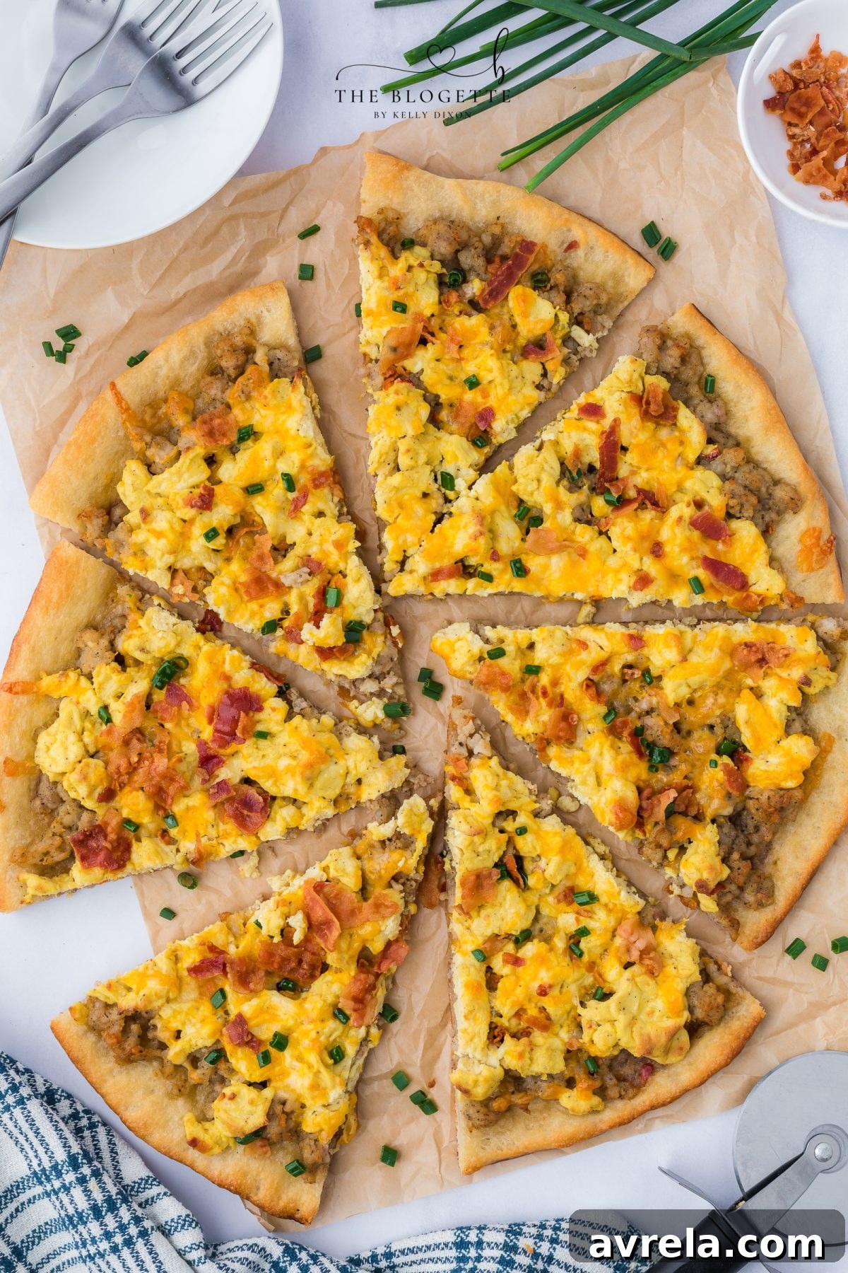 Rise and Shine Pizza 13 A close-up shot of a single slice of breakfast pizza, showcasing the crispy crust and rich toppings, perfect for reheating.
