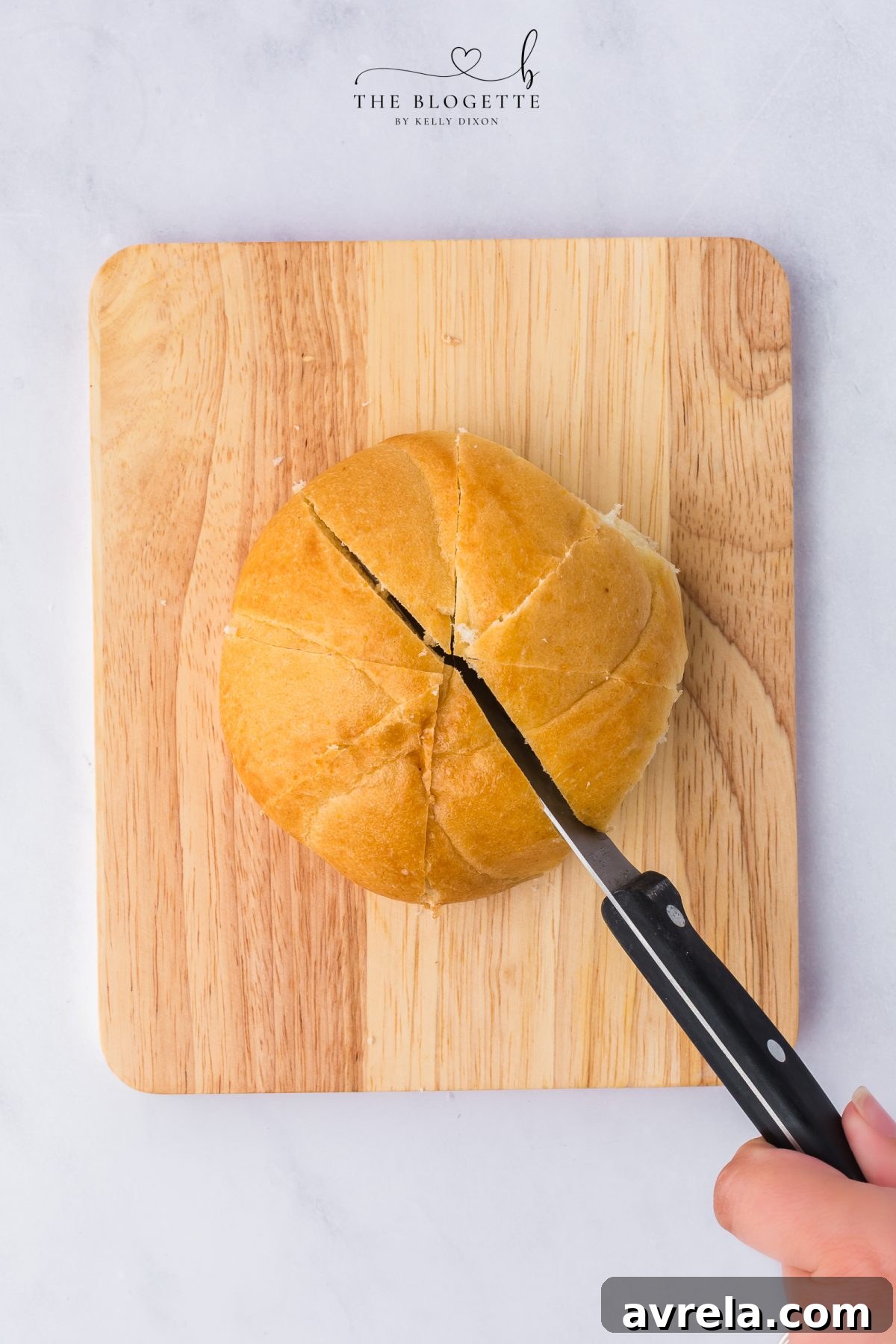 Seoul's Signature Cream Cheese Garlic Bread 6 Slicing the brioche rolls for garlic bread