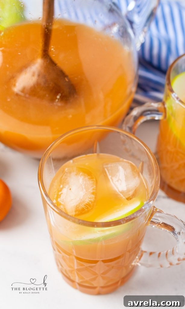 A festive Breakfast Punch, decorated with fruit and ready for Christmas or holiday gatherings.