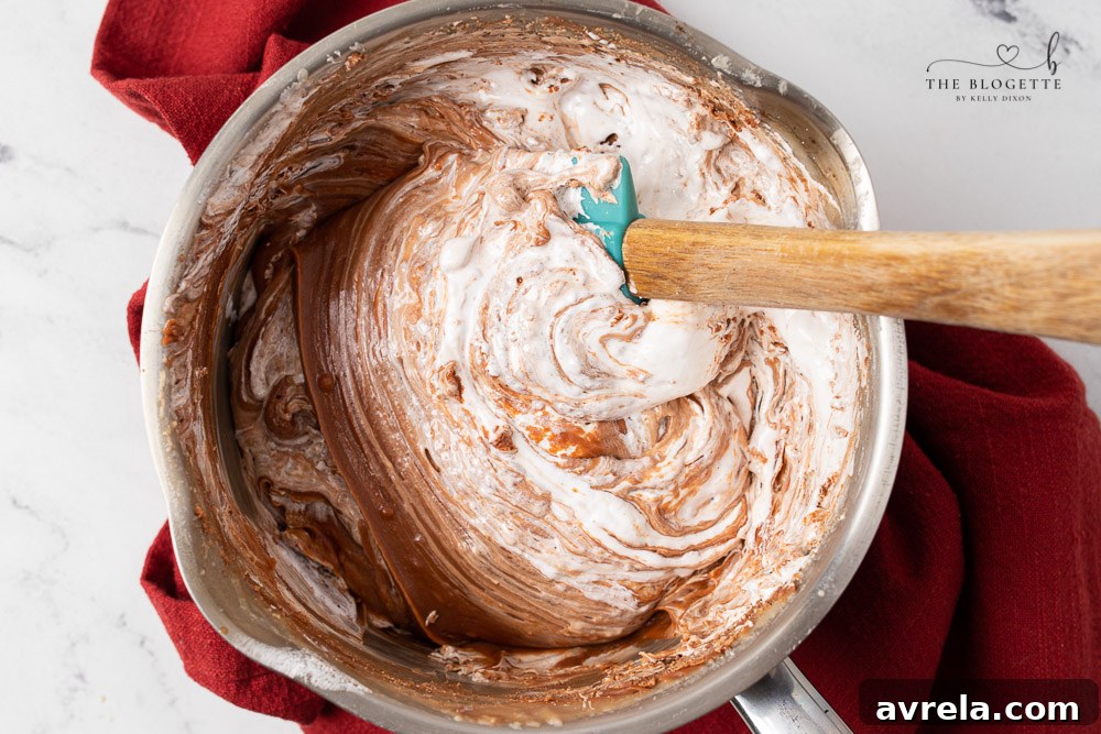 Preparing the fudge mixture in a pot on the stovetop