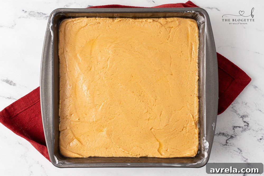 Delicious layered fudge cooling in a square dish