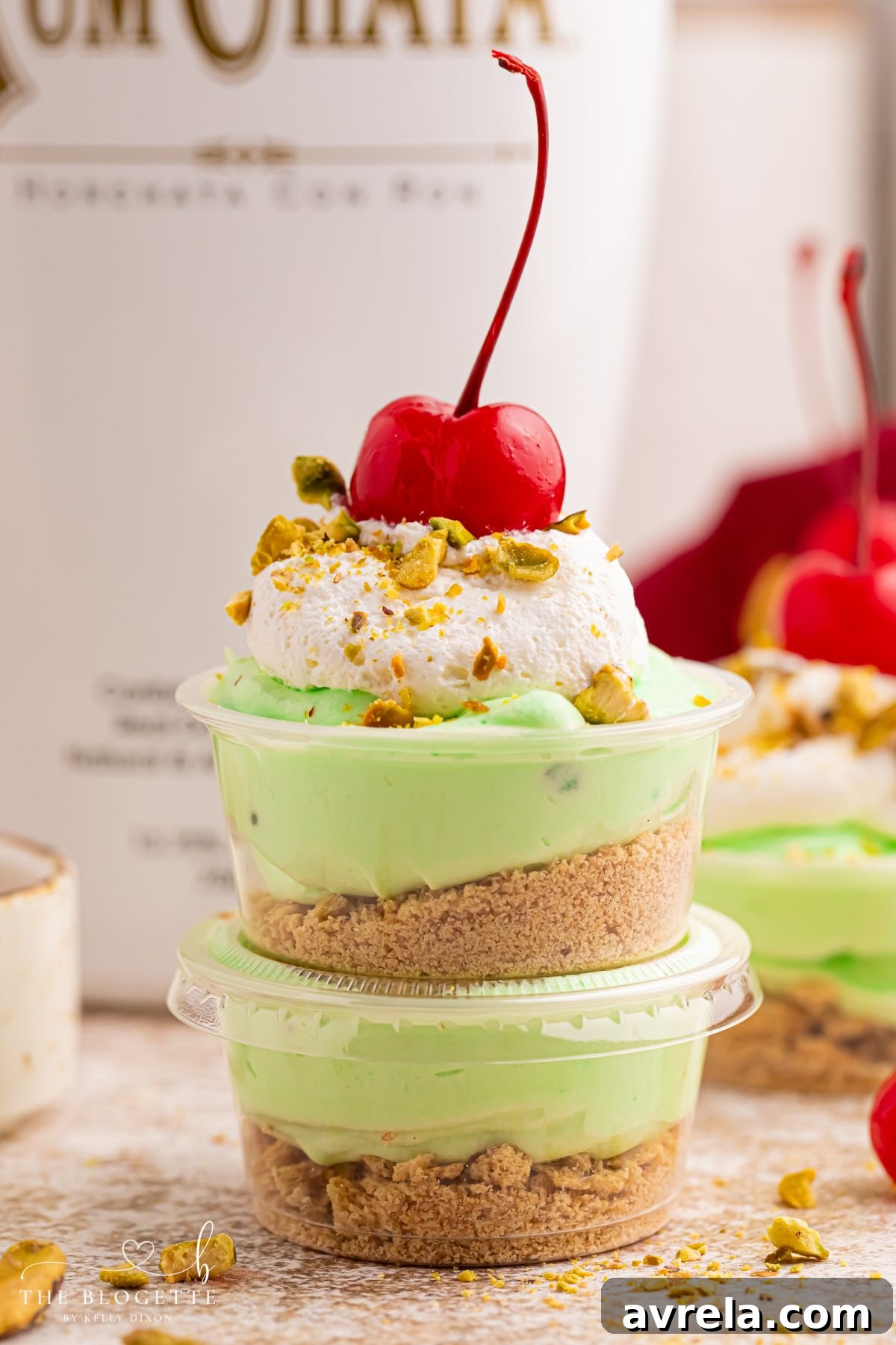 Velvety Pistachio Pudding Shots 3 These creamy Pistachio Pudding Shots are the cutest party dessert! Made with pistachio pudding mix, RumChata, Cool Whip, and graham cracker topping. Perfect for holiday parties, girls’ night, St. Patrick’s Day treats, and easy no-bake desserts. Save this RumChata pudding shot recipe!