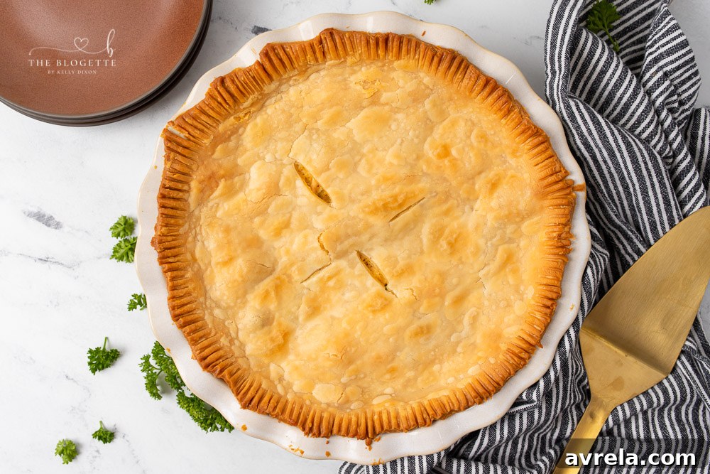 A freshly baked Homemade Chicken Pot Pie, hot out of the oven, with a perfect golden crust.